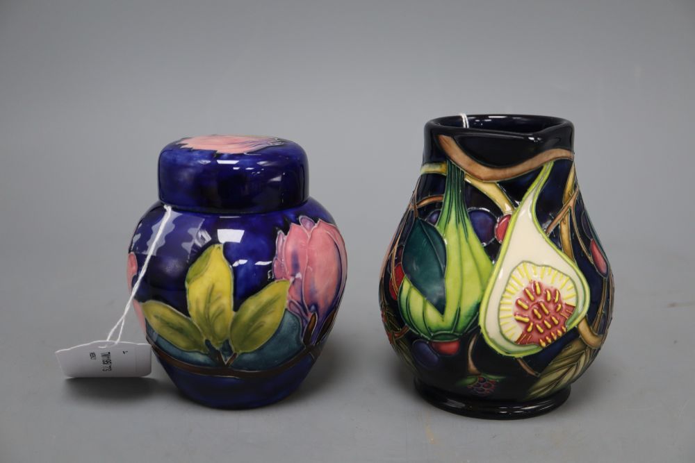 A Moorcroft Queens Choice blue ground bulbous jug and a Hibiscus ginger jar and cover, tallest 12cm